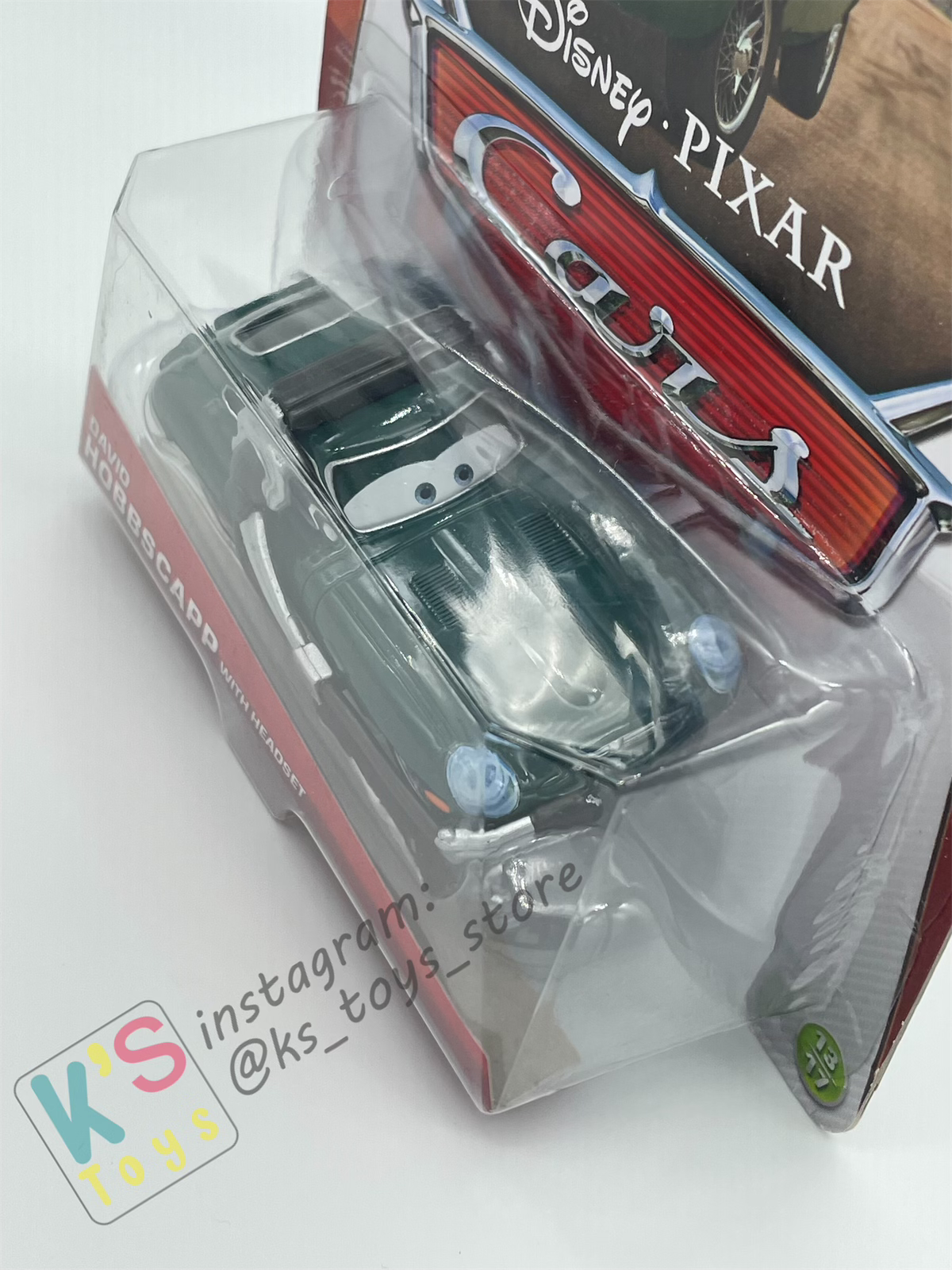 DISNEY PIXAR CARS BY MATTEL, DAVID HOBBSCAPP WITH HEADSET- BNIP