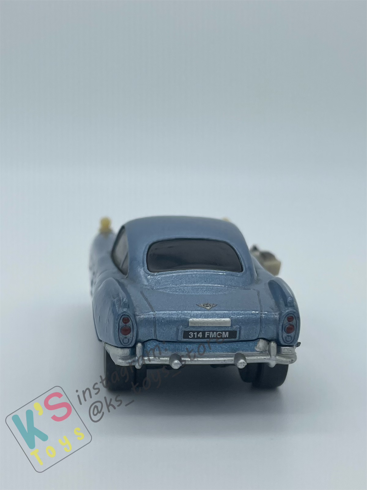 PRE-OWNED / LOOSE DISNEY PIXAR CARS - "FINN MCMISSILE WITH WEAPON" - CARS 2 MOVIE MOMENTS SERIES - PLAYED CONDITION