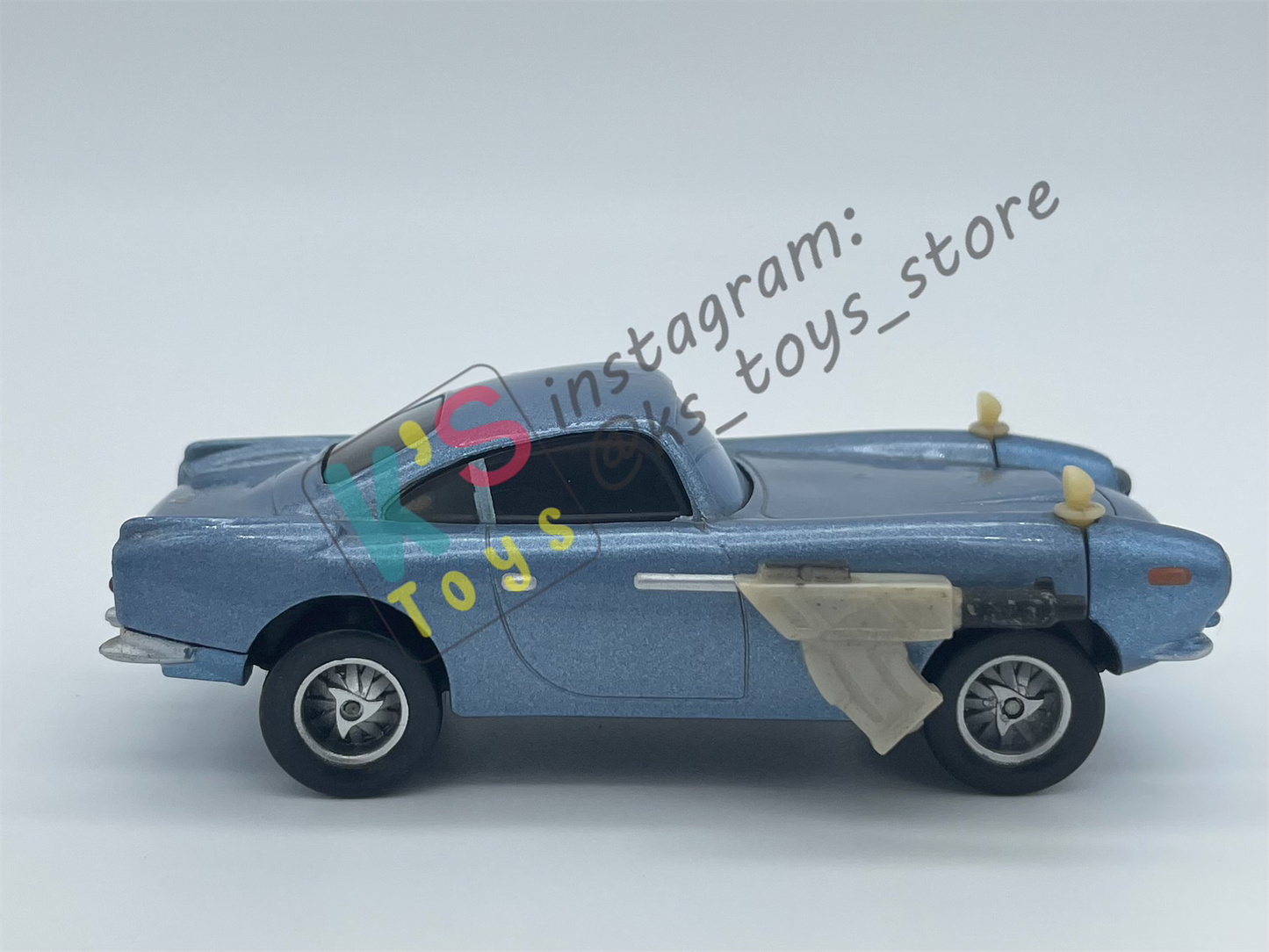 PRE-OWNED / LOOSE DISNEY PIXAR CARS - "FINN MCMISSILE WITH WEAPON" - CARS 2 MOVIE MOMENTS SERIES - PLAYED CONDITION