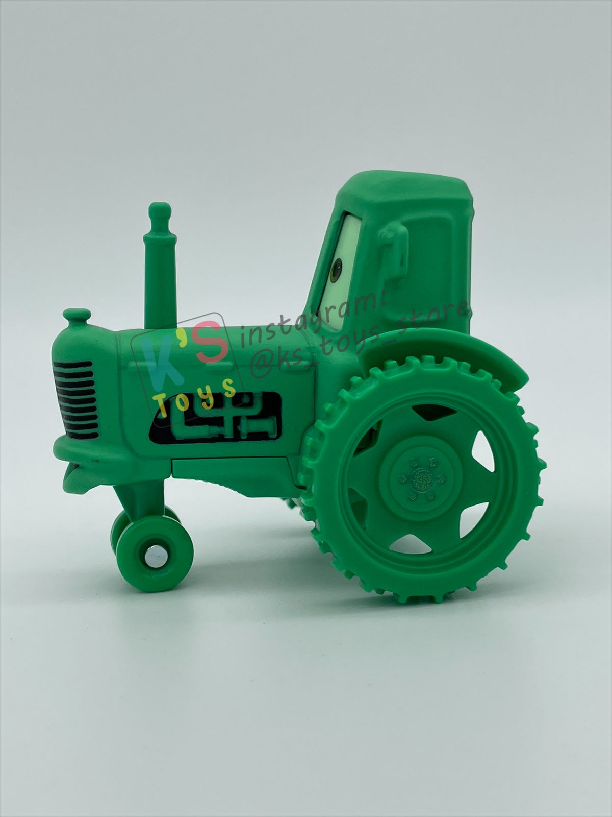 PRE-OWNED / LOOSE DISNEY PIXAR CARS 1:55 BY MATTEL - "GHOST TRACTOR" CARS ON THE ROAD LIGHTS OUT - MINT CONDITION