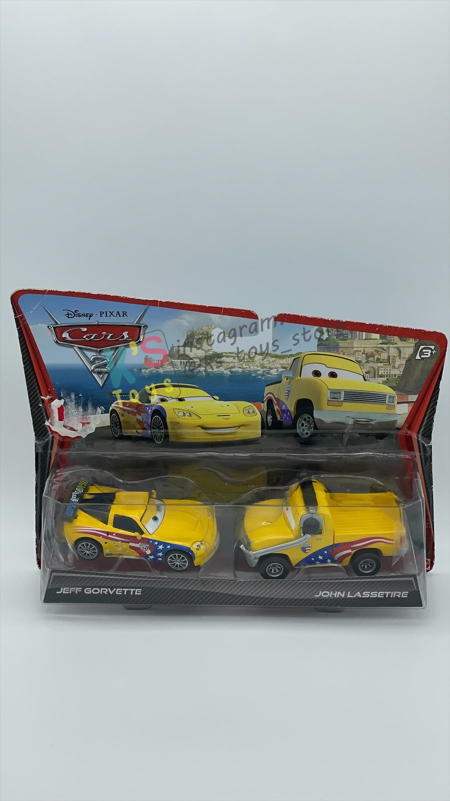 Disney Pixar Cars 1:55 2-Pack by Mattel, "JEFF GORVETTE & JOHN LASSETIRE" - WGP CARS 2 - BNIP CARD IS NOT IN MINT CONDITION!!