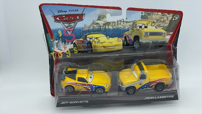 Disney Pixar Cars 1:55 2-Pack by Mattel, "JEFF GORVETTE & JOHN LASSETIRE" - WGP CARS 2 - BNIP CARD IS NOT IN MINT CONDITION!!