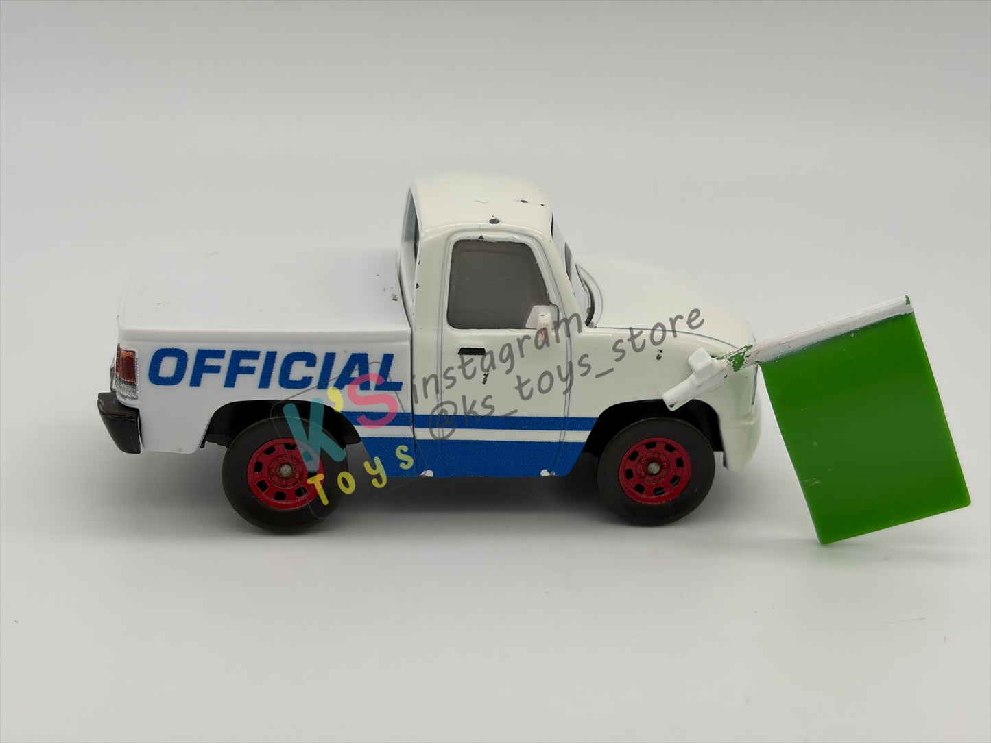 PRE-OWNED / LOOSE DISNEY PIXAR CARS BY MATTEL - "KRIS REVSTOPSKI (WITH GREEN FLAG)" - CARS 3 SERIES - GOOD CONDITION - READ DESCRIPTION!!!!!!!!!!!
