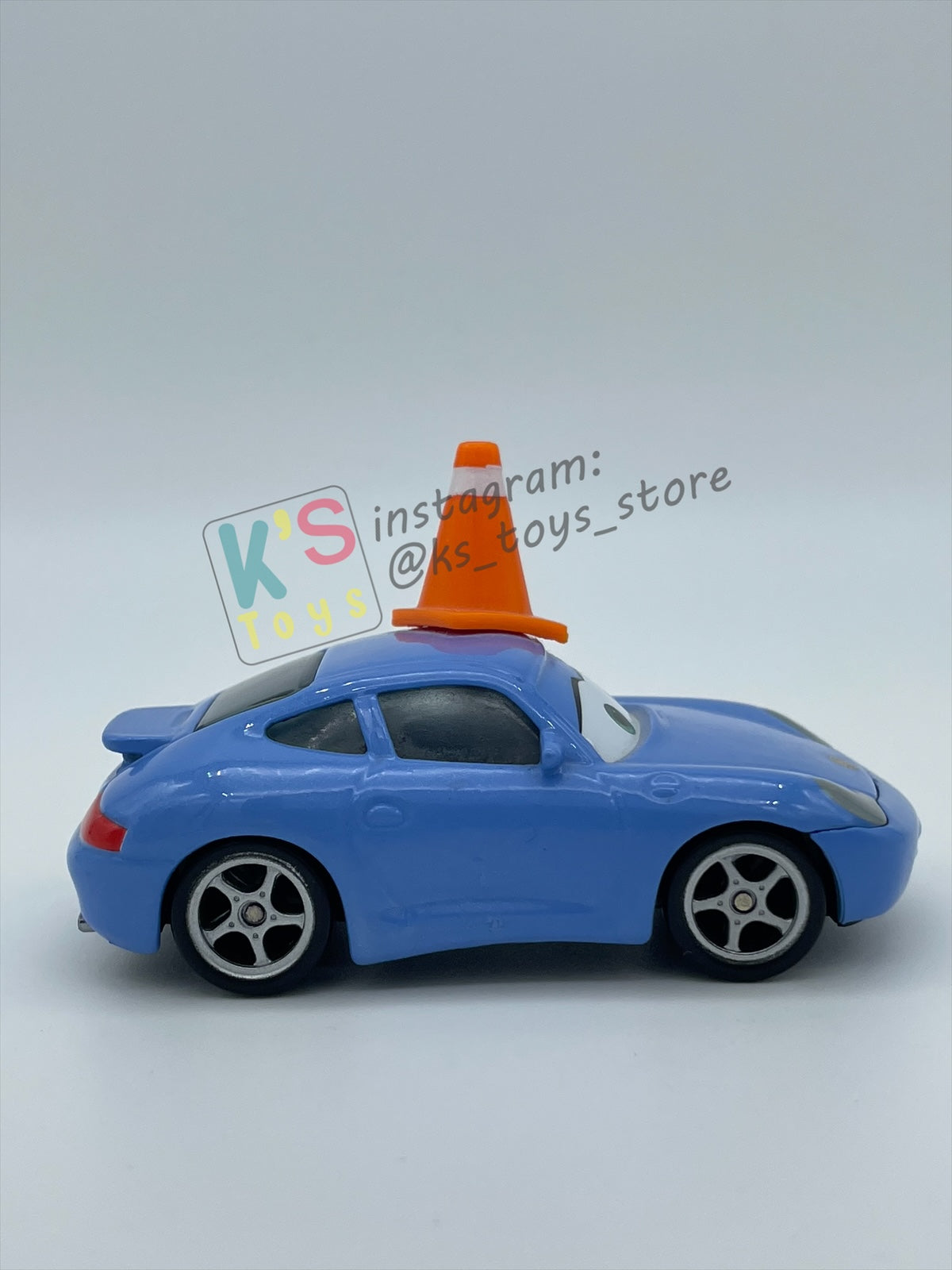 PRE-OWNED / LOOSE DISNEY PIXAR CARS 1:55 BY MATTEL - "SALLY WITH CONE & TATTOO" CARS SERIES - MINT CONDITION