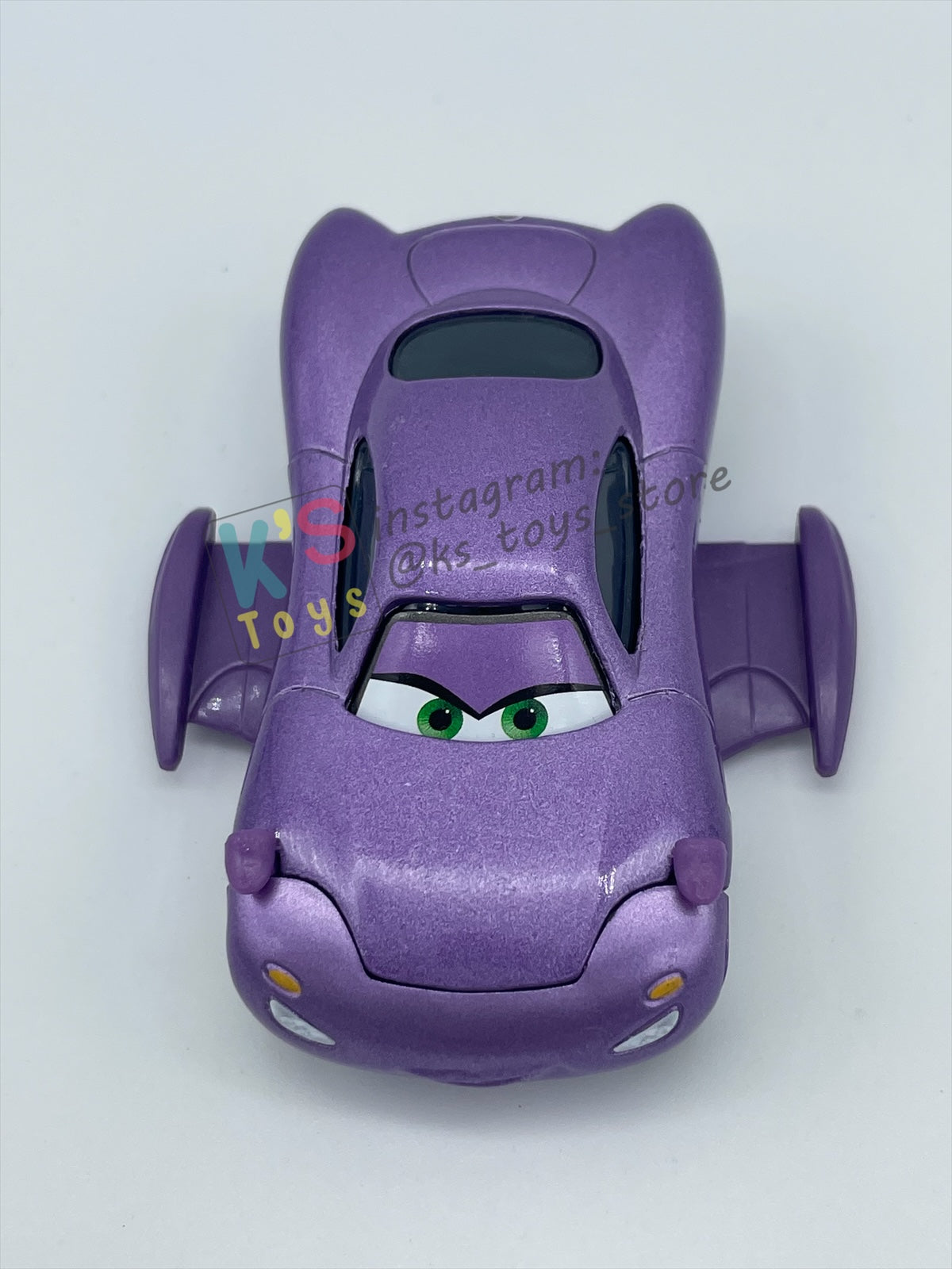 PRE-OWNED / LOOSE DELUXE DISNEY PIXAR CARS BY MATTEL - "HOLLEY SHIFTWELL WITH WINGS" CARS 2 PALACE CHAOS SERIES - MINT CONDITION