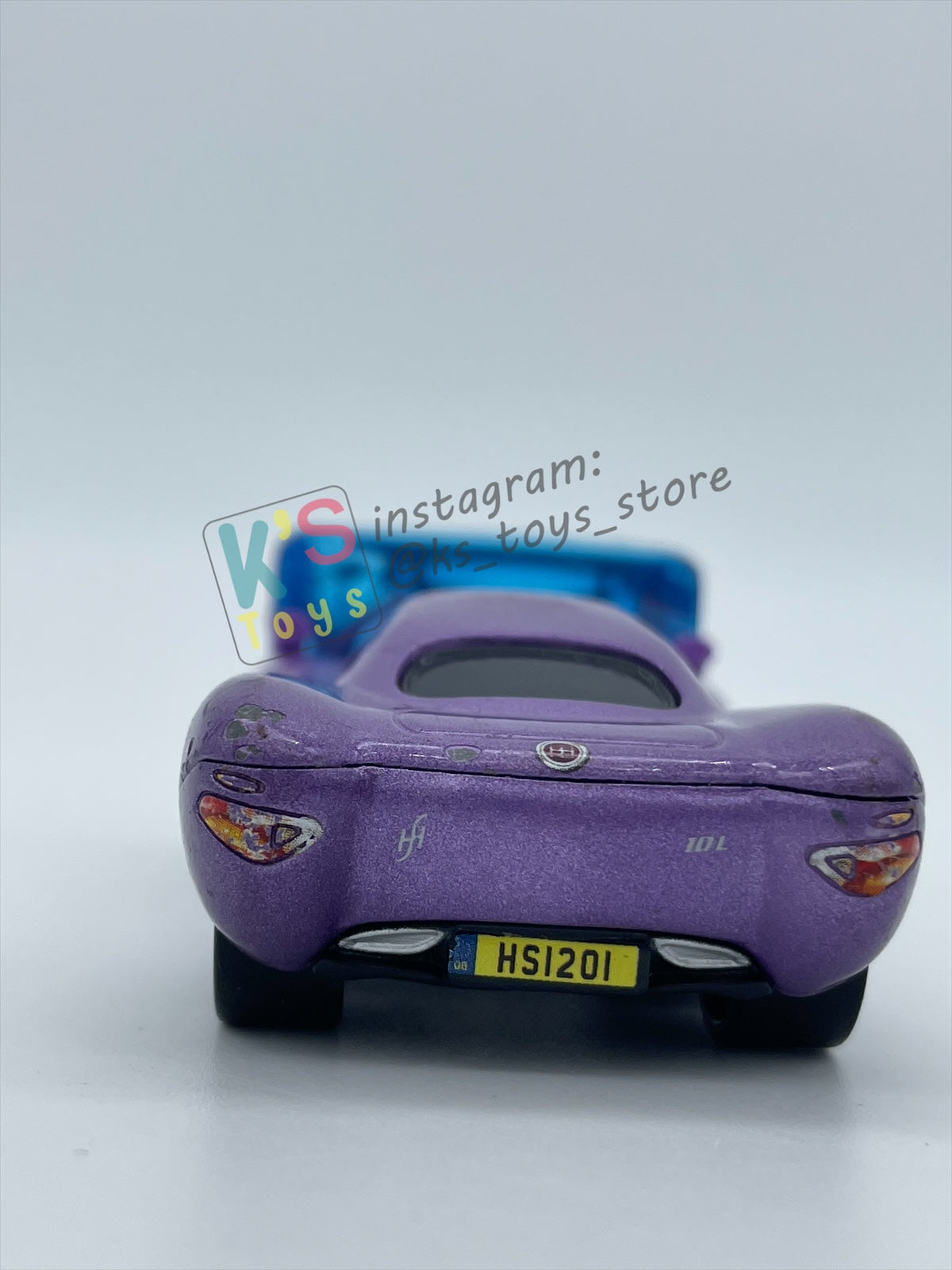 PRE-OWNED / LOOSE DISNEY PIXAR CARS 1:55 BY MATTEL - "HOLLEY SHIFTWELL WITH SCREEN" CARS 2 PALACE CHAOS SERIES - IN GOOD CONDITION
