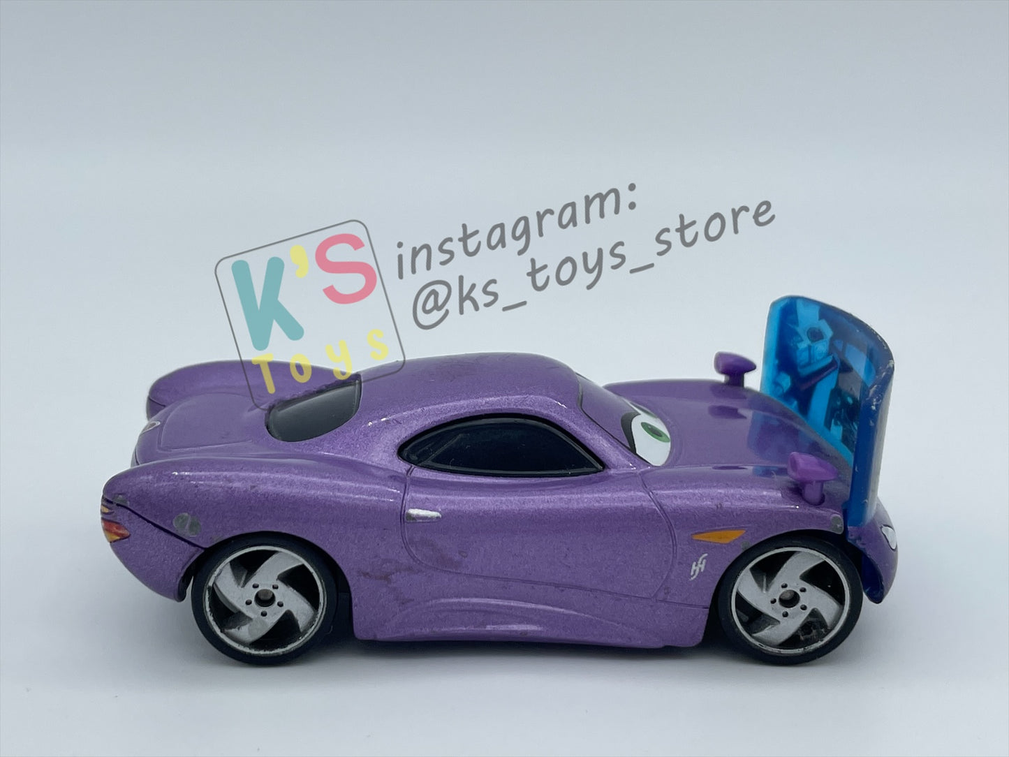 PRE-OWNED / LOOSE DISNEY PIXAR CARS 1:55 BY MATTEL - "HOLLEY SHIFTWELL WITH SCREEN" CARS 2 PALACE CHAOS SERIES - IN GOOD CONDITION