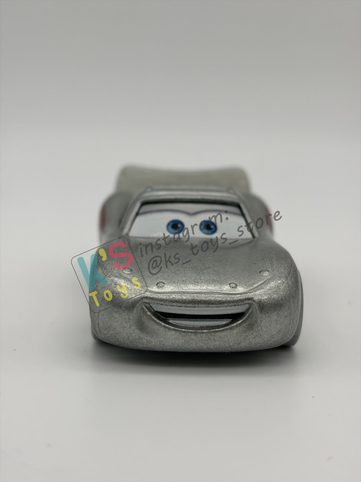 PRE-OWNED / LOOSE DISNEY PIXAR CARS 1:55 BY MATTEL - "DISNEY 100 YEAR SILVER LIGHTNING MCQUEEN" DISNEY 100 YEAR ANNIVERSARY SERIES - NEAR MINT CONDITION