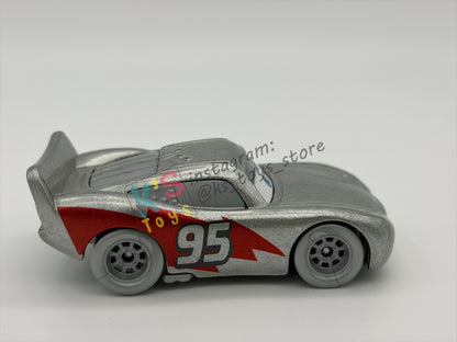 PRE-OWNED / LOOSE DISNEY PIXAR CARS 1:55 BY MATTEL - "DISNEY 100 YEAR SILVER LIGHTNING MCQUEEN" DISNEY 100 YEAR ANNIVERSARY SERIES - NEAR MINT CONDITION