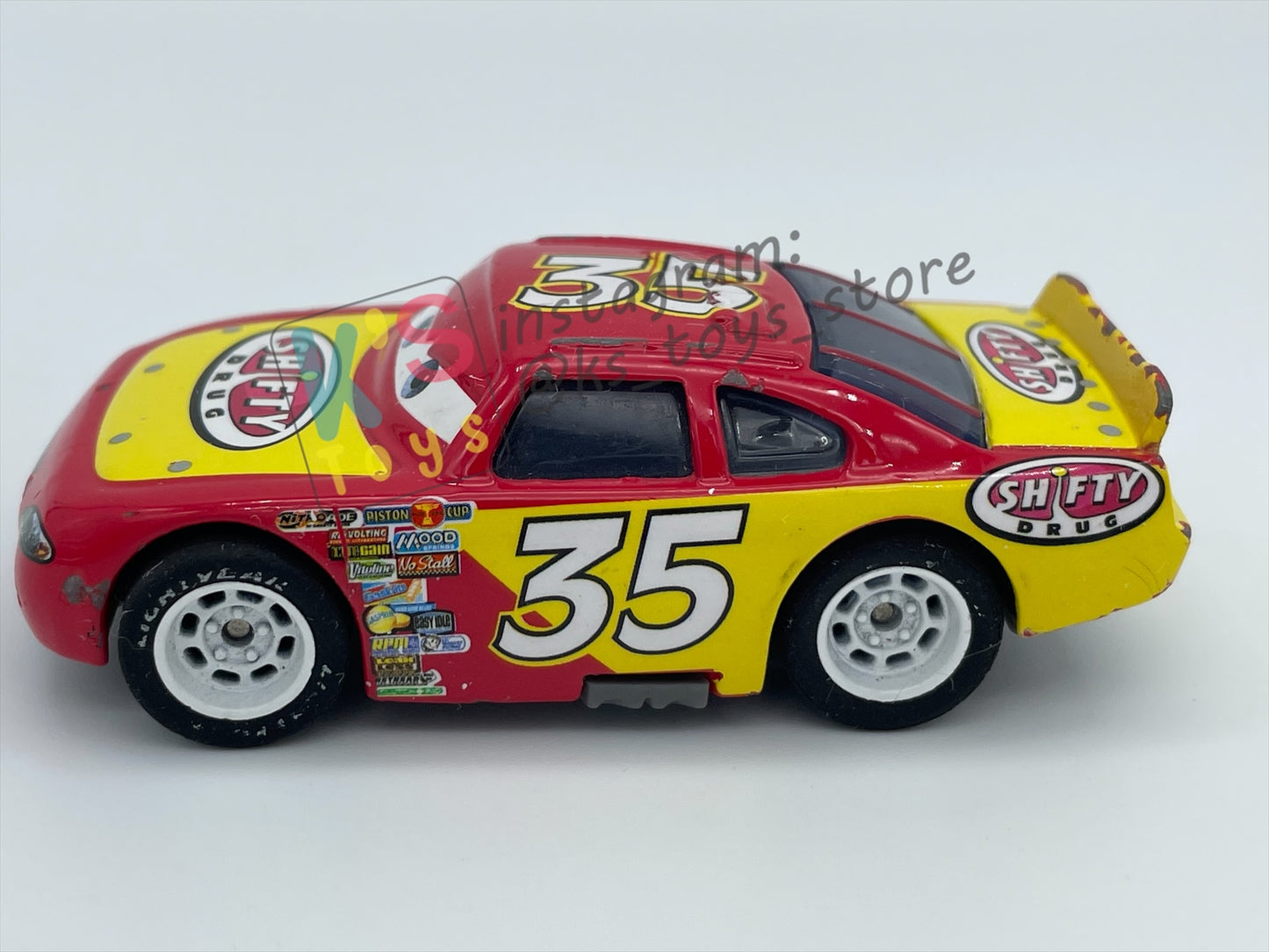 PRE-OWNED / LOOSE DISNEY PIXAR CARS BY MATTEL - "KEVING RACINGTIRE RUBBER TIRES" - PLAYED WITH CONDITION - READ DESCRIPTION!!!!!!!!!!!