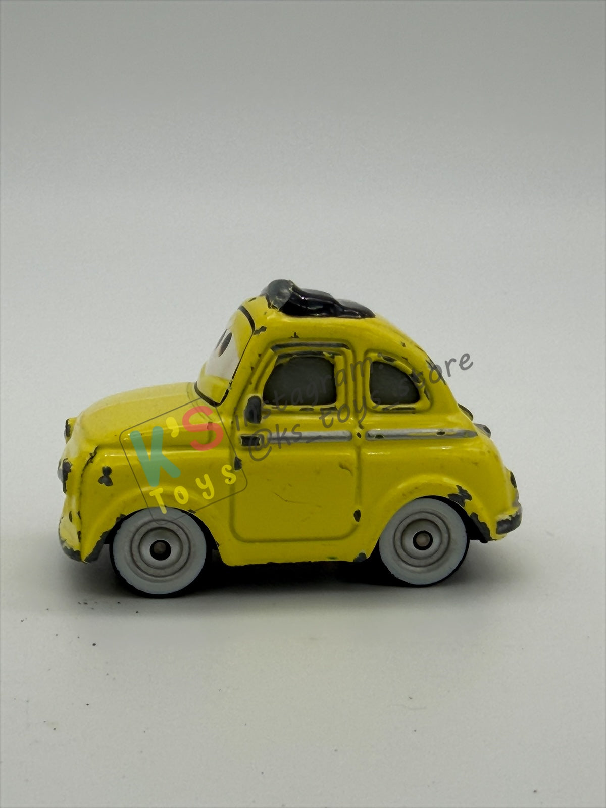 FREE ITEM!! PRE-OWNED / LOOSE DISNEY PIXAR CARS - "LUIGI" WELL-PLAYED CONDITION
