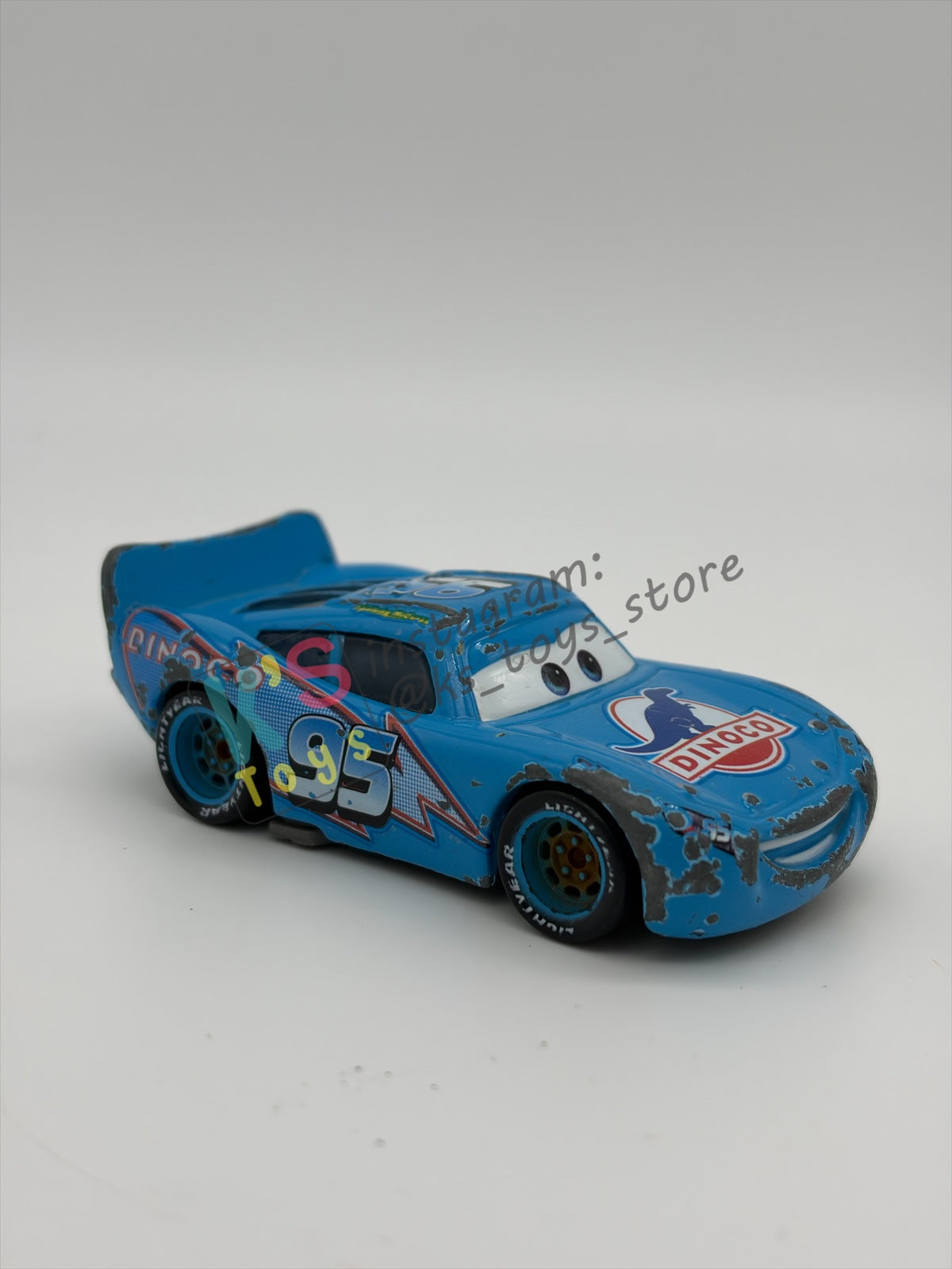 FREE ITEM!! PRE-OWNED / LOOSE DISNEY PIXAR CARS - "DINOCO LIGHTNING MCQUEEN" WELL-PLAYED CONDITION