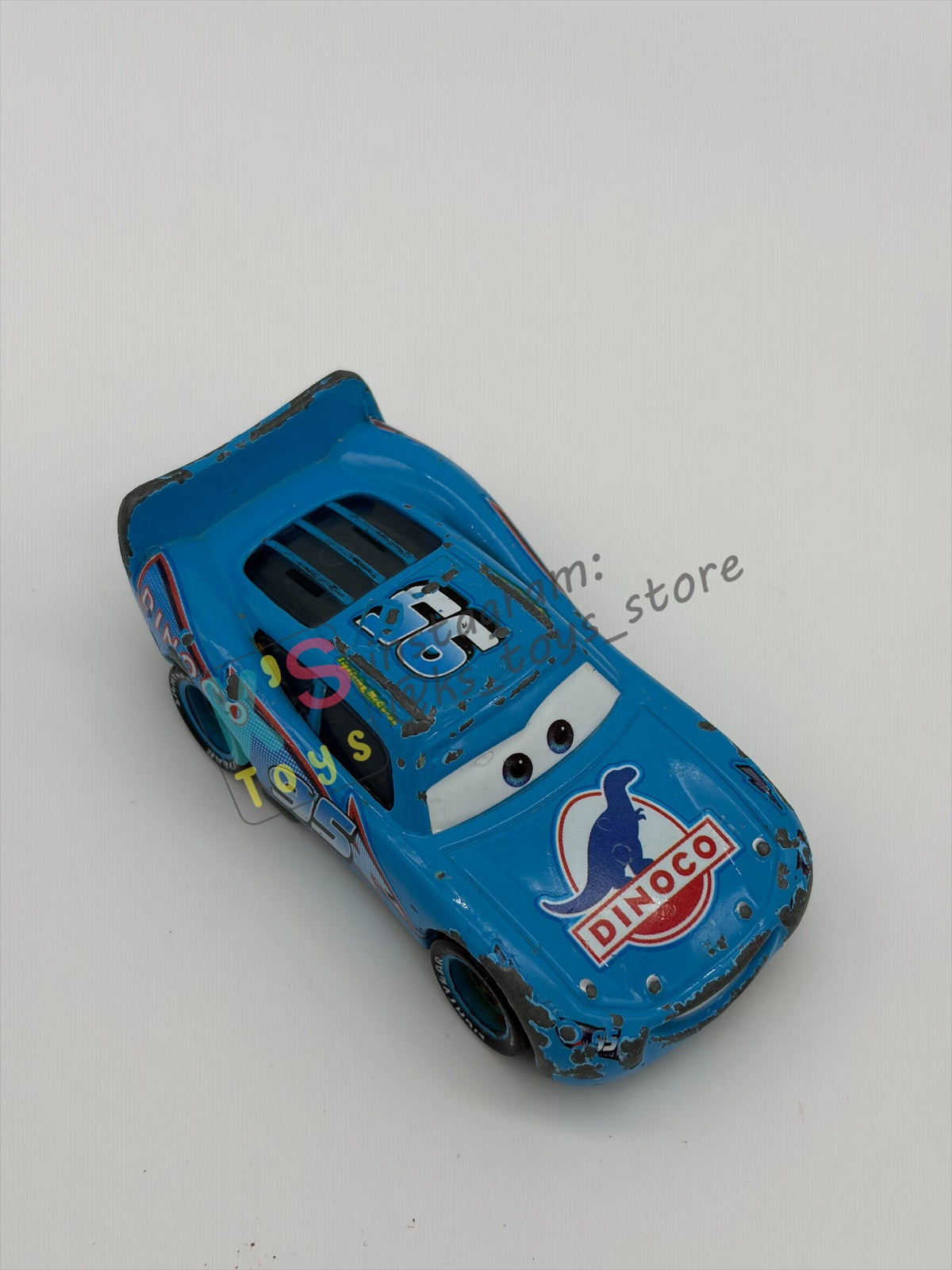 FREE ITEM!! PRE-OWNED / LOOSE DISNEY PIXAR CARS - "DINOCO LIGHTNING MCQUEEN" WELL-PLAYED CONDITION