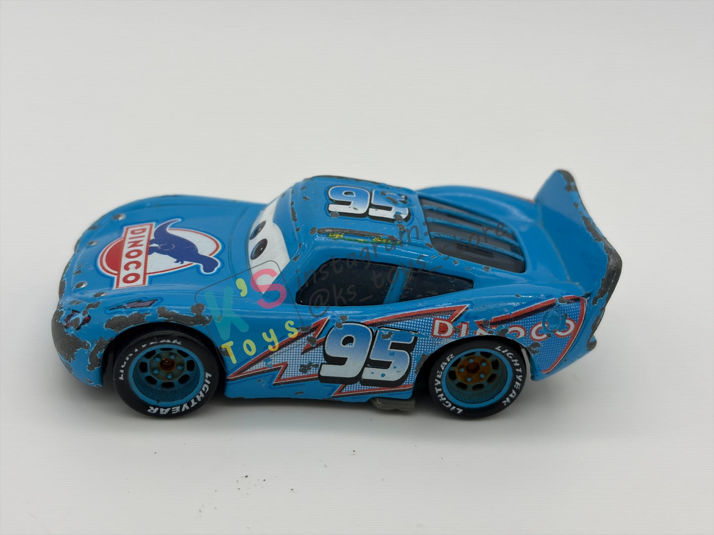 FREE ITEM!! PRE-OWNED / LOOSE DISNEY PIXAR CARS - "DINOCO LIGHTNING MCQUEEN" WELL-PLAYED CONDITION