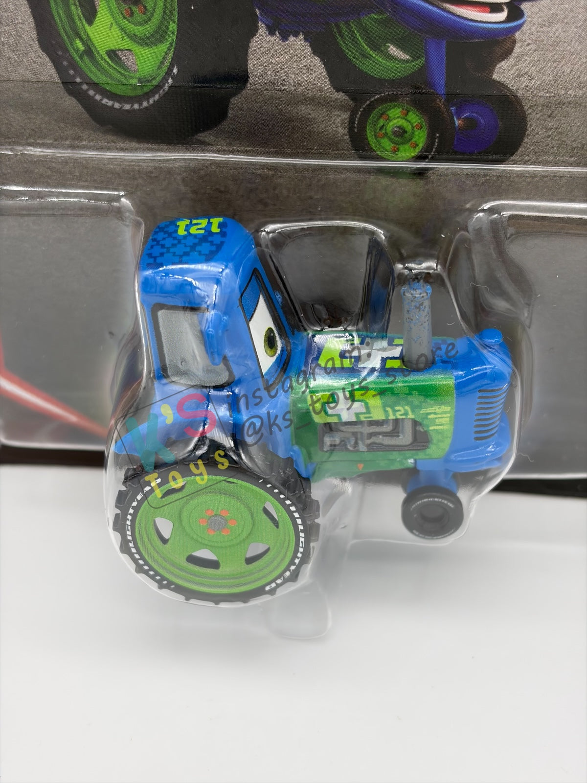 DISNEY PIXAR CARS 1:55 BY MATTEL - "CLUTCH AID RACING TRACTOR" 2026 RE-RELEASED 20TH ANNIVERSARY CARD - BNIP