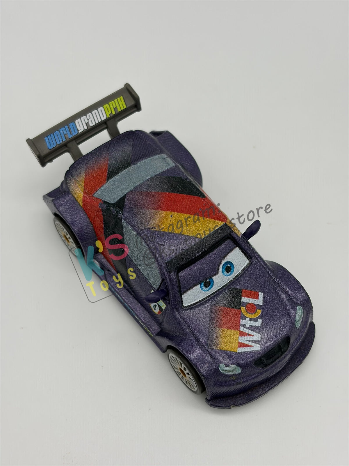 PRE-OWNED / LOOSE DISNEY PIXAR CARS BY MATTEL - "MAX SCHNELLS" - CARS 2 SERIES - PLAYED CONDITION - READ DESCRIPTION!!!!!!!!!!!