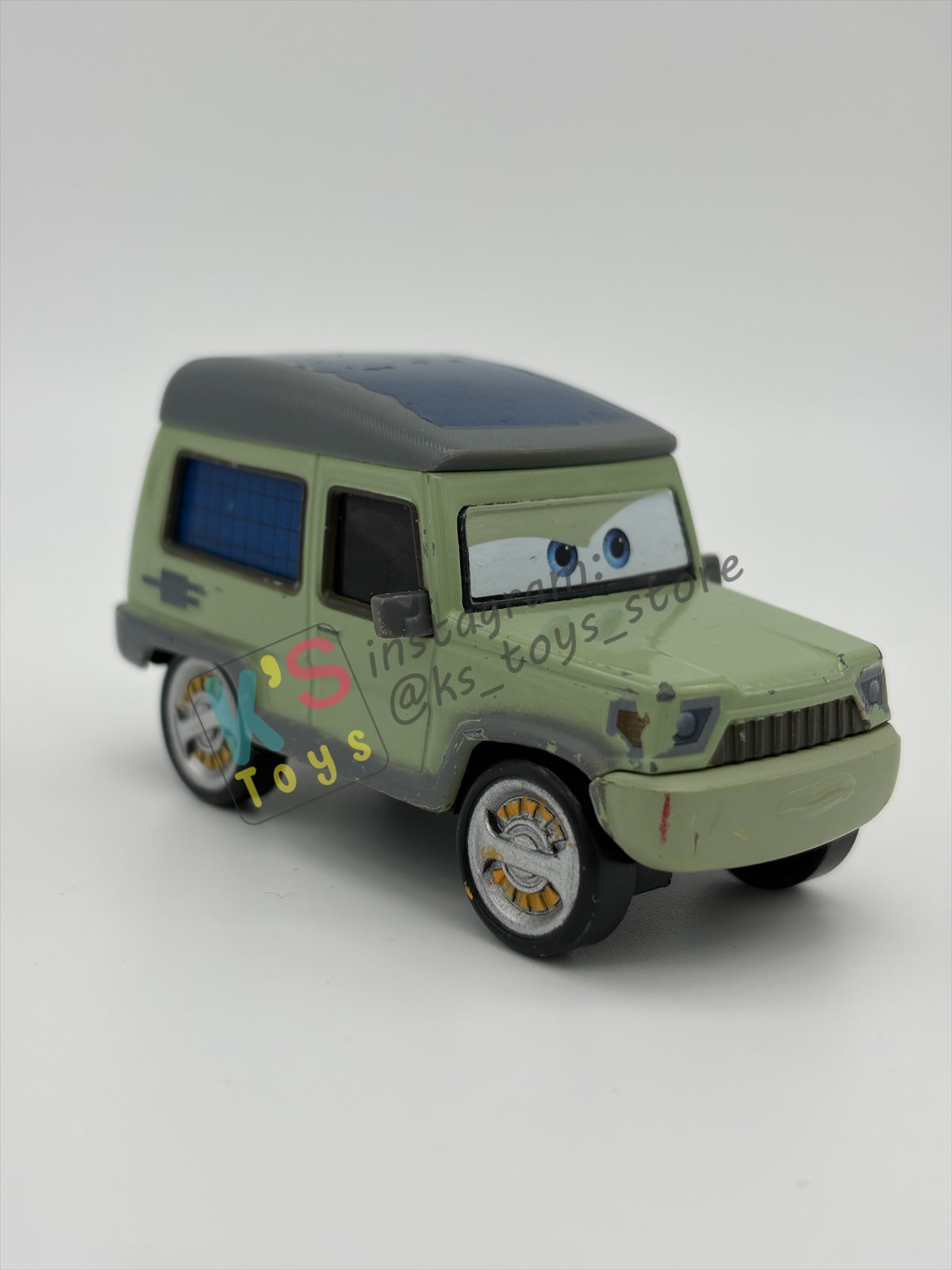 PRE-OWNED / LOOSE DISNEY PIXAR CARS BY MATTEL - "MILES AXLEROD” - CARS 2 SERIES - GOOD CONDITION - READ DESCRIPTION!!!!!!!!!!!