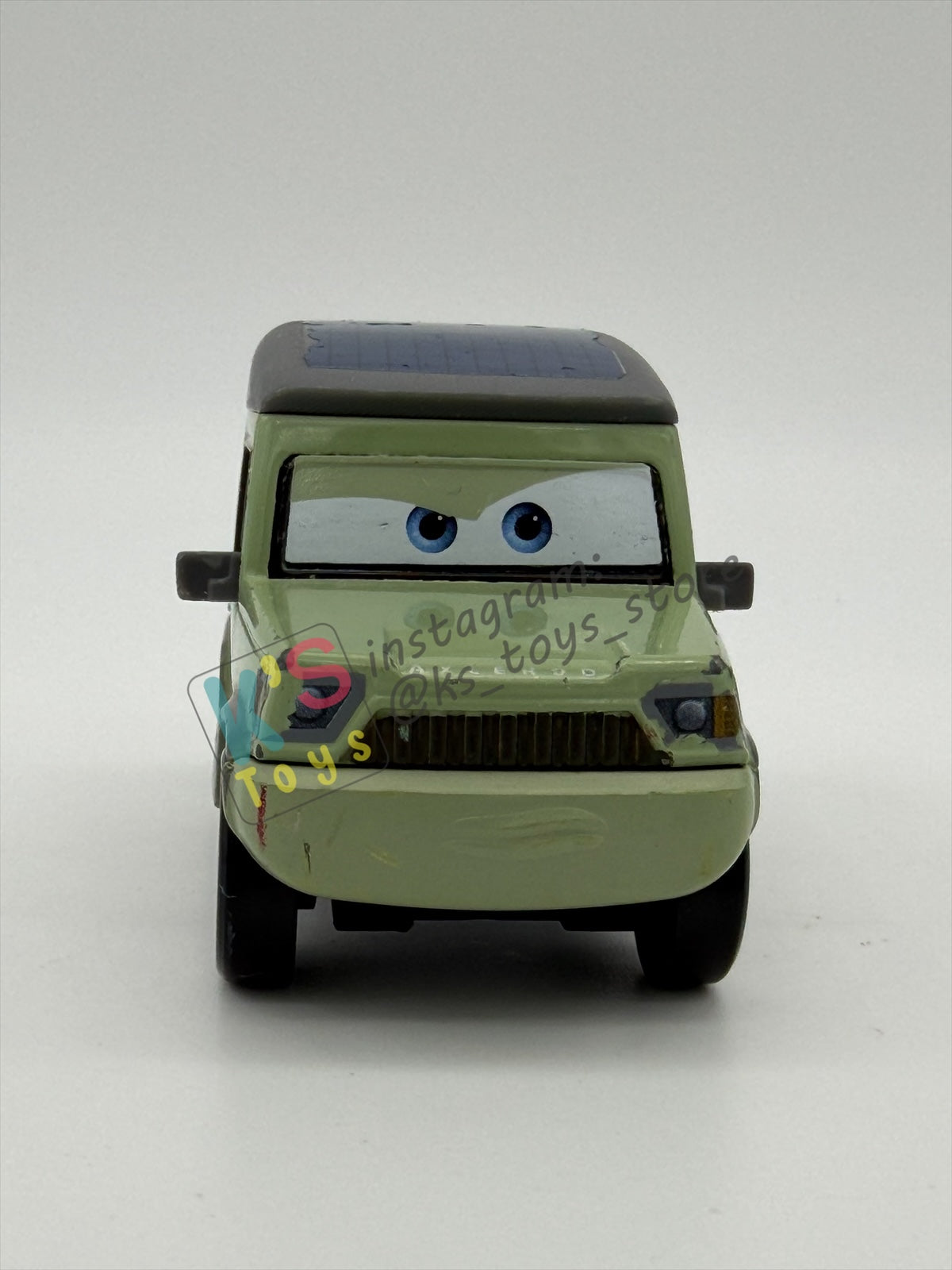 PRE-OWNED / LOOSE DISNEY PIXAR CARS BY MATTEL - "MILES AXLEROD” - CARS 2 SERIES - GOOD CONDITION - READ DESCRIPTION!!!!!!!!!!!