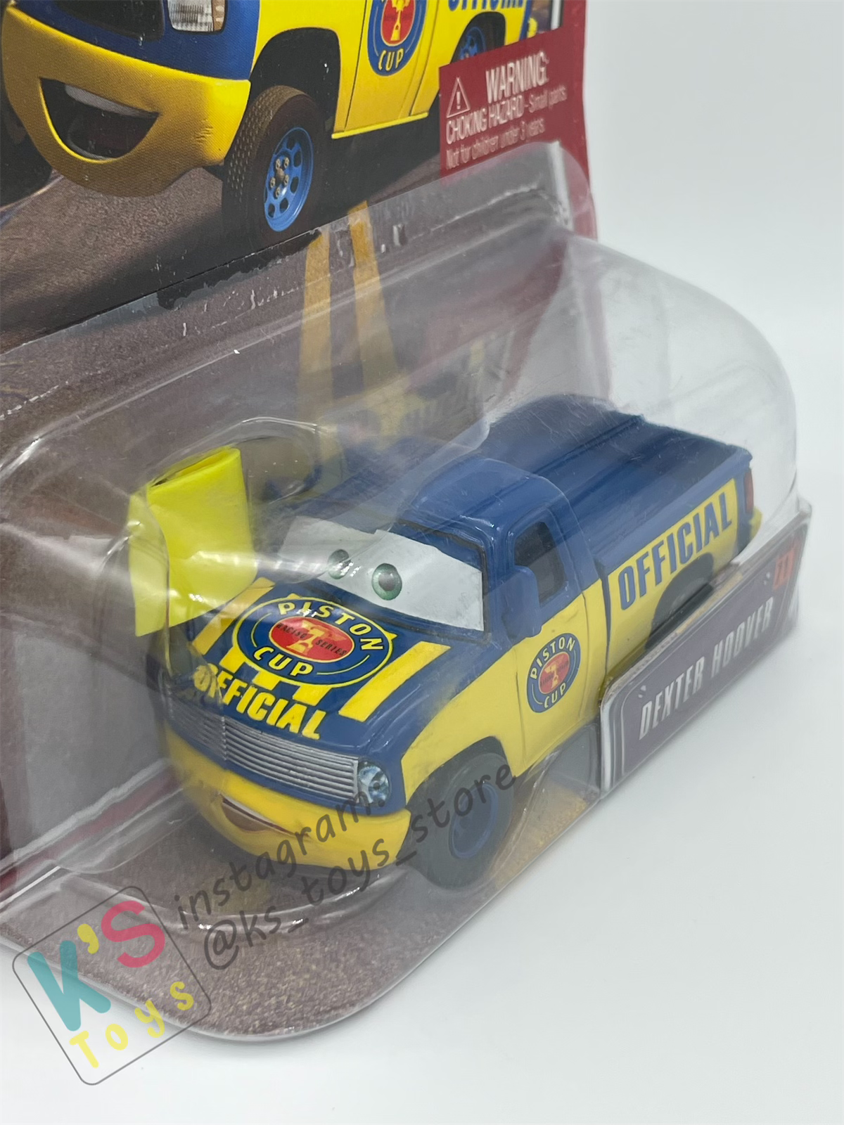 DISNEY PIXAR CARS BY MATTEL, DEXTER HOOVER WITH YELLOW FLAG - THE WORLD OF CARS SERIES  - BNIP