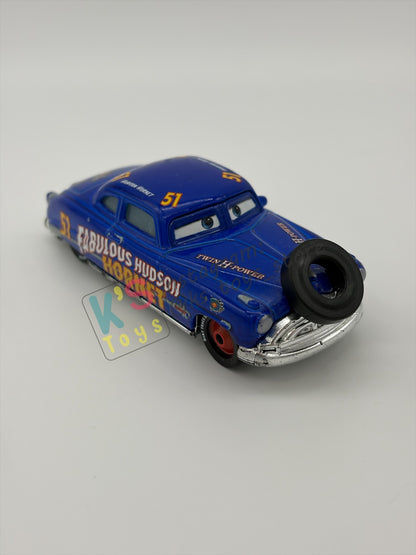 PRE-OWNED / LOOSE DISNEY PIXAR CARS - "FABULOUS HUDSON HORNET WITH TIRE" - FUNNY FLASHBACK - GOOD CONDITION