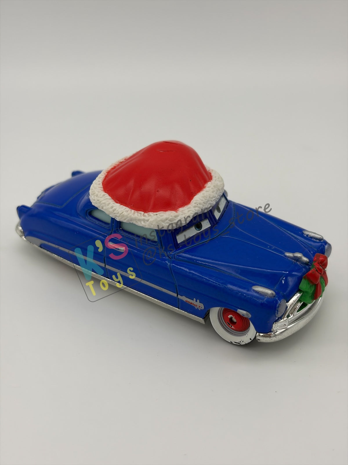 PRE-OWNED / LOOSE DISNEY PIXAR CARS - "DECKED OUT DOC HUDSON" - MATER SAVES CHRISTMAS - GOOD CONDITION