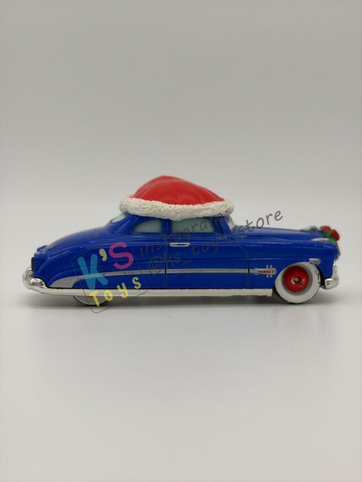 PRE-OWNED / LOOSE DISNEY PIXAR CARS - "DECKED OUT DOC HUDSON" - MATER SAVES CHRISTMAS - GOOD CONDITION