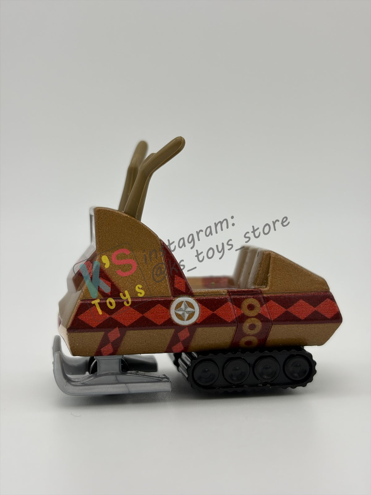 PRE-OWNED / LOOSE DISNEY PIXAR CARS - "SNOWMOBILE" - MATER SAVES CHRISTMAS - NEAR MINT CONDITION
