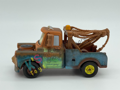 PRE-OWNED / LOOSE DISNEY PIXAR CARS - "MATER WITH OIL CAN" CHASE LENTICULAR EYES SERIES - MISSING OIL CAN - DISPLAYED CONDITION