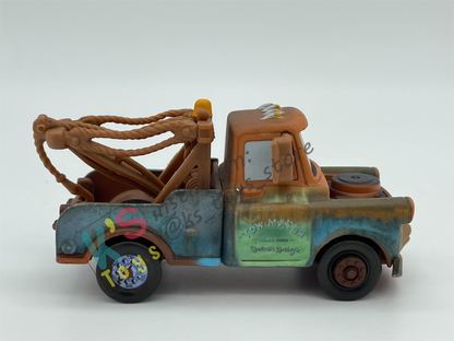 PRE-OWNED / LOOSE DISNEY PIXAR CARS - "MATER WITH OIL CAN" CHASE LENTICULAR EYES SERIES - MISSING OIL CAN - DISPLAYED CONDITION
