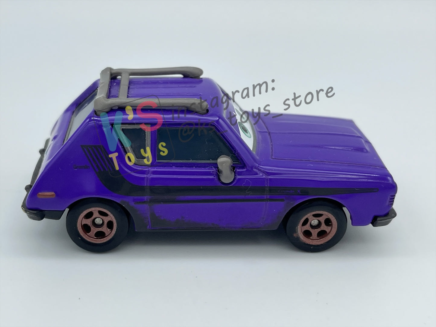 PRE-OWNED / LOOSE DISNEY PIXAR CARS - "DON CRUMLIN (GREEN EYES)" CARS 2 SERIES - MINT / NEAR MINT CONDITION - READ DESCRIPTION!!!!!!!!!!