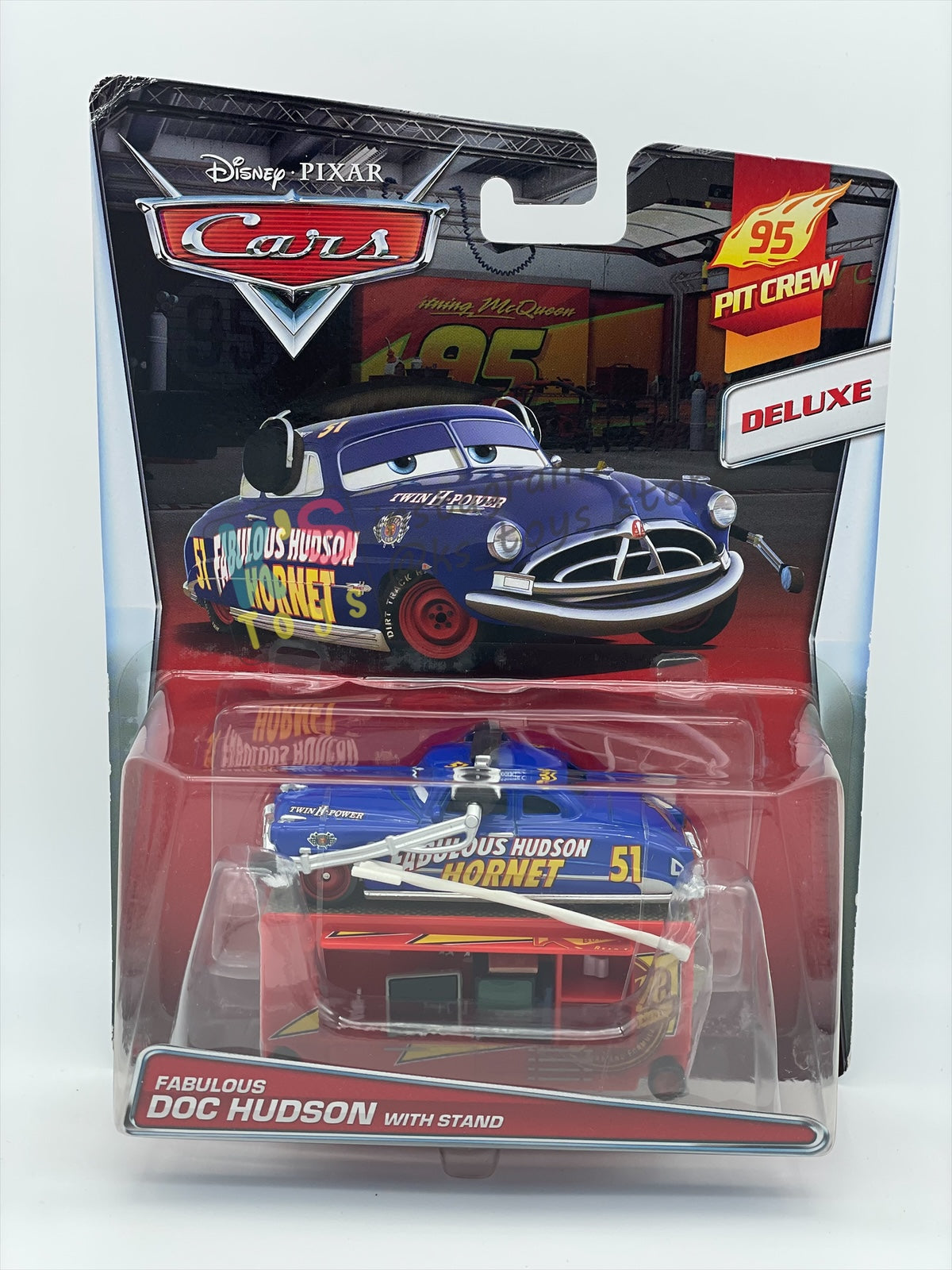 Rare DELUXE Disney Pixar Cars by Mattel, Fabulous Hudson with Stand - 95 PIT CREW SERIES - BNIP