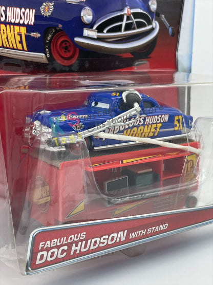 Rare DELUXE Disney Pixar Cars by Mattel, Fabulous Hudson with Stand - 95 PIT CREW SERIES - BNIP