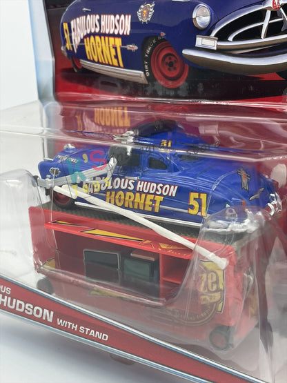 Rare DELUXE Disney Pixar Cars by Mattel, Fabulous Hudson with Stand - 95 PIT CREW SERIES - BNIP