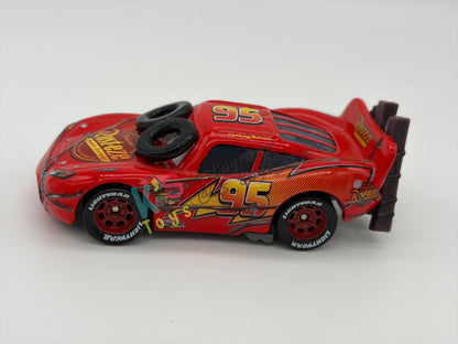 PRE-OWNED / LOOSE DISNEY PIXAR CARS - "SPINOUT LIGHTNING MCQUEEN" THE WORLD OF CARS SERIES - NEAR MINT CONDITION - READ DESCRIPTION!!!!!!