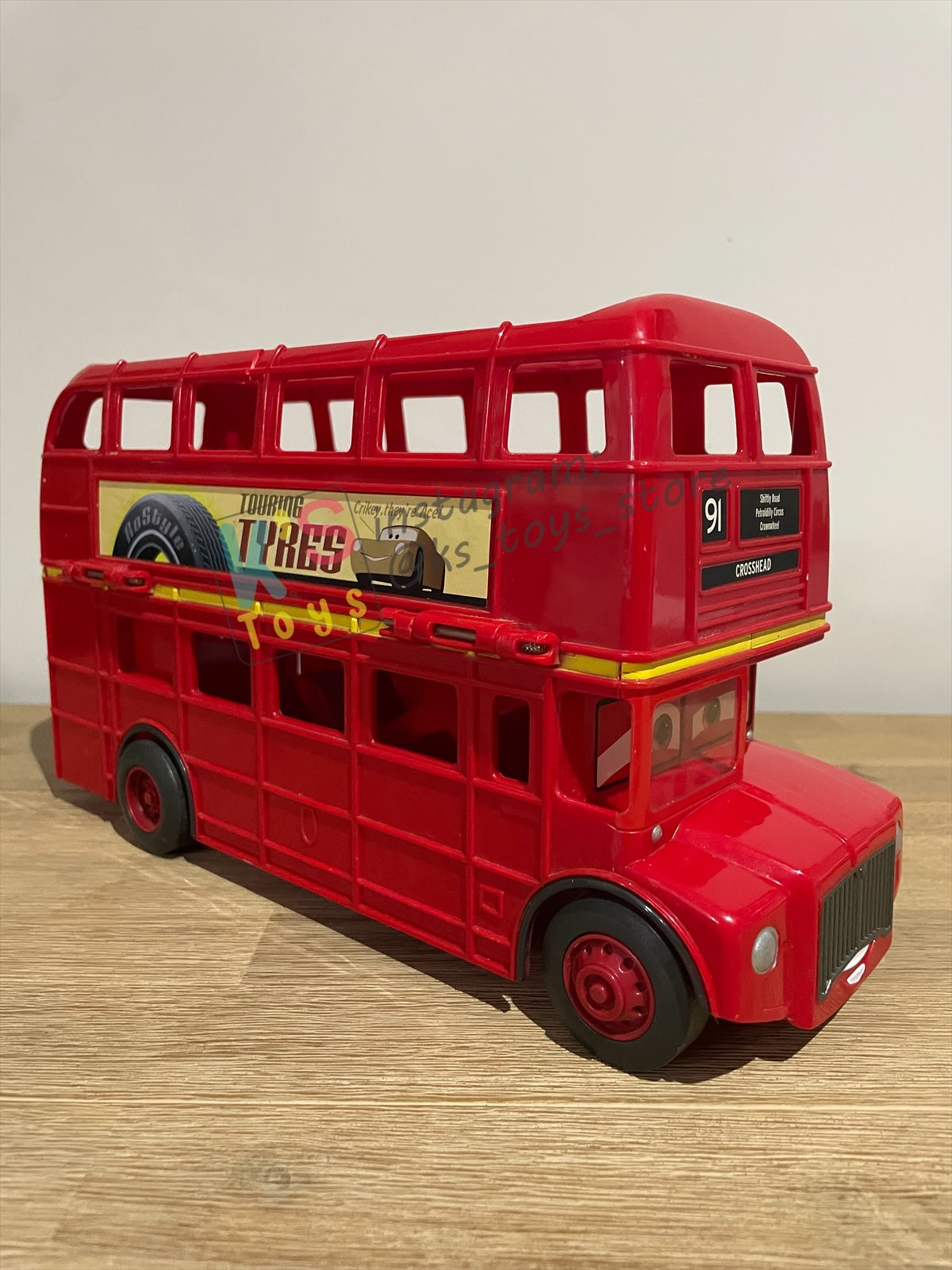 PRE-OWNED / LOOSE DISNEY PIXAR CARS BY MATTEL - "DOUBLE DECKER LONDON BUS CARRY CASE" CARS 2 - PLAYED IN GOOD CONDITION - SMALL CRACKED, READ DESCRIPTION!!!!!!!!!!