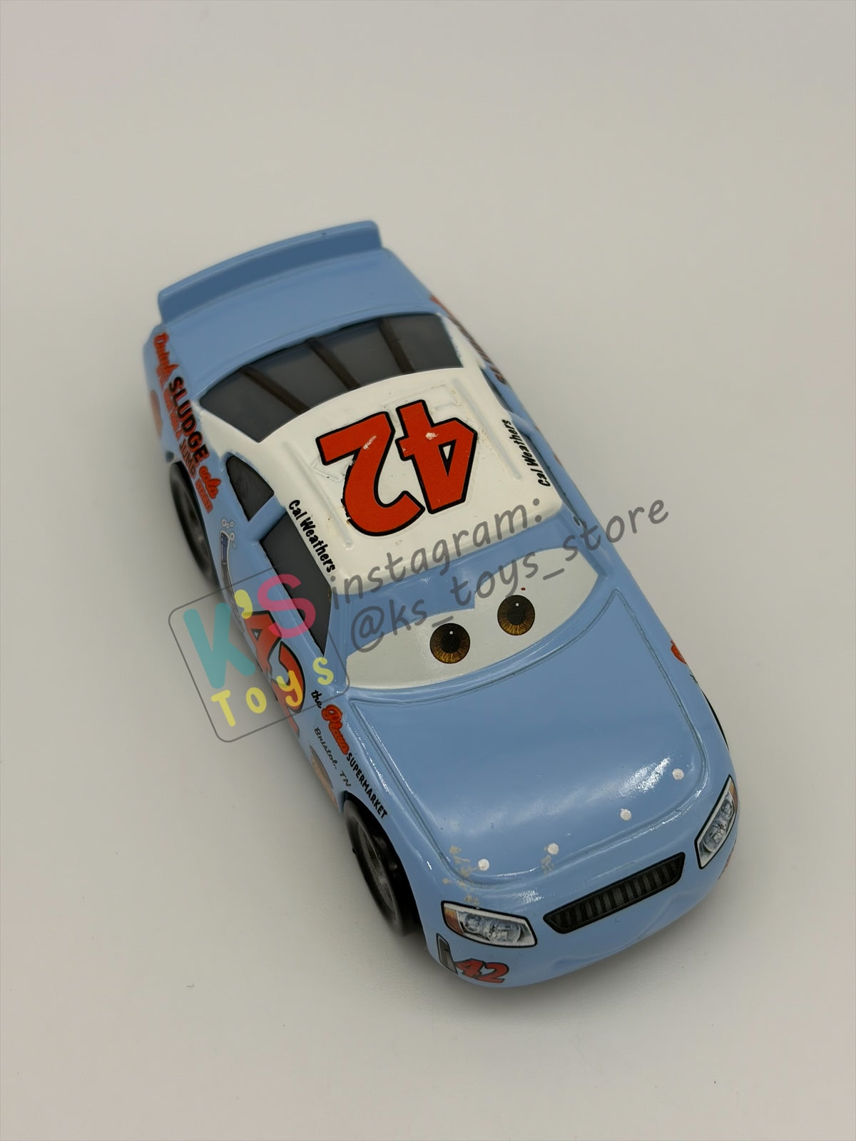 PRE-OWNED / LOOSE DISNEY PIXAR CARS 1:55 BY MATTEL - "CAL WEATHERS" THOMASVILLE RACING LEGENDS SERIES - NEAR MINT CONDITION