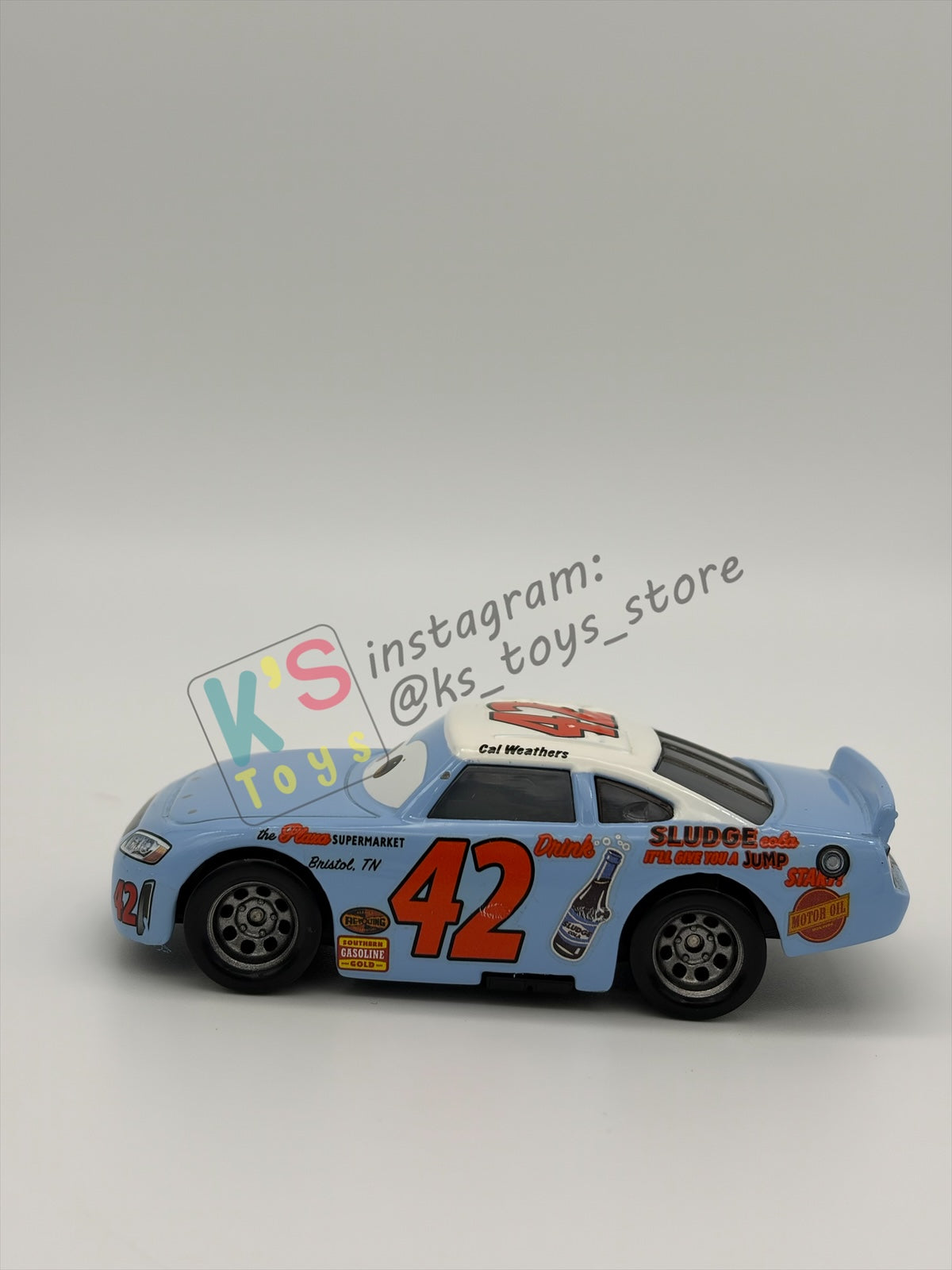 PRE-OWNED / LOOSE DISNEY PIXAR CARS 1:55 BY MATTEL - "CAL WEATHERS" THOMASVILLE RACING LEGENDS SERIES - NEAR MINT CONDITION