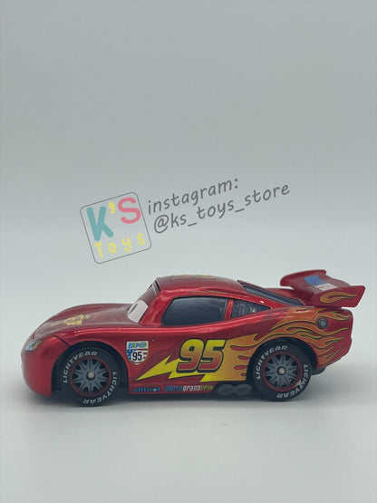 PRE-OWNED / LOOSE DISNEY PIXAR CARS - "LIGHTNING MCQUEEN WITH METALLIC FINISH" EXCLUSIVE VEHICLE ONLY AT TOYRUS - READ DESCRIPTION!!!