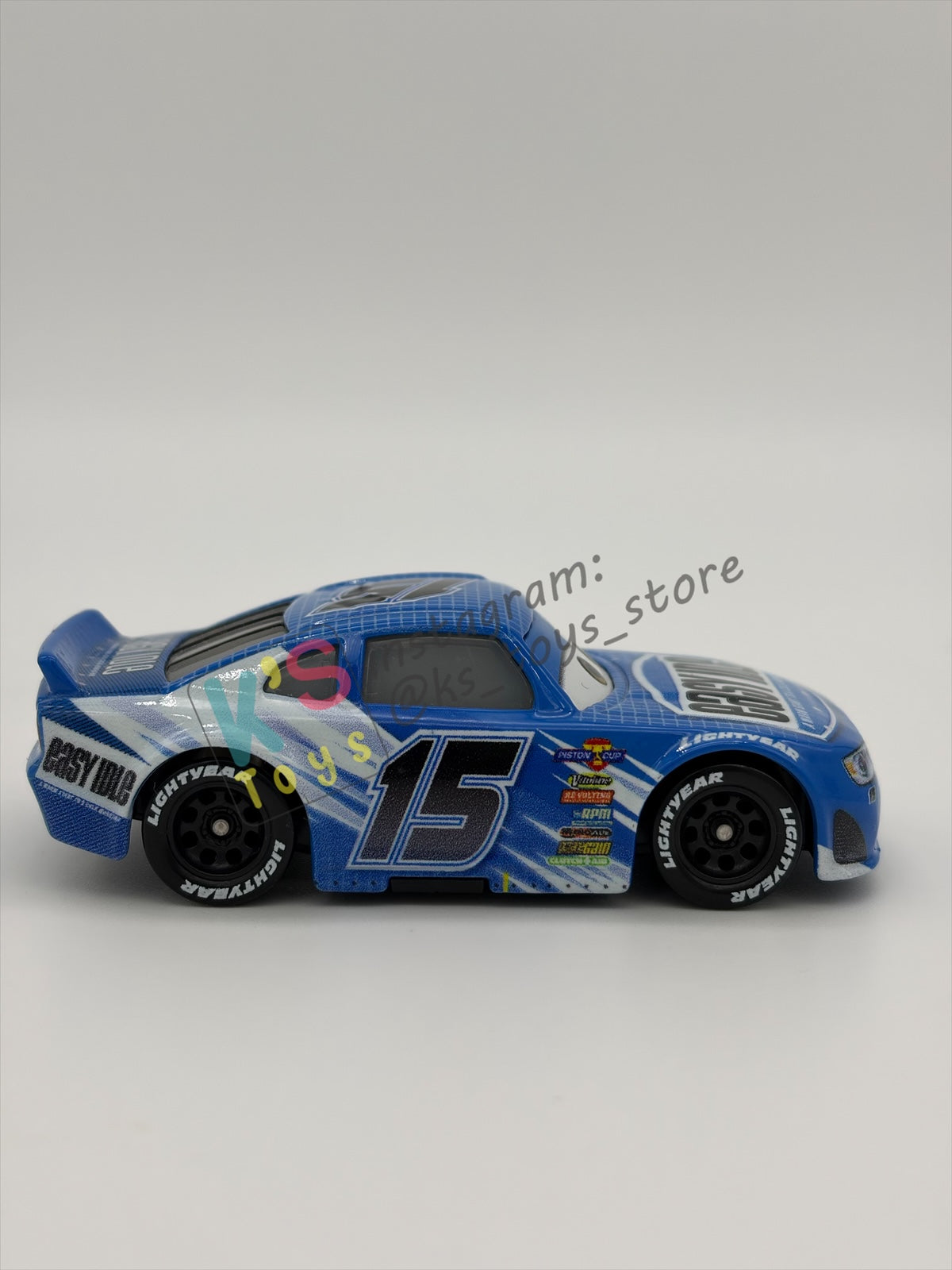 PRE-OWNED / LOOSE DISNEY PIXAR CARS 1:55 BY MATTEL - "CARL CLUTCHEN" - CARS 3 PISTON CUP RACERS - NEAR MINT CONDITION