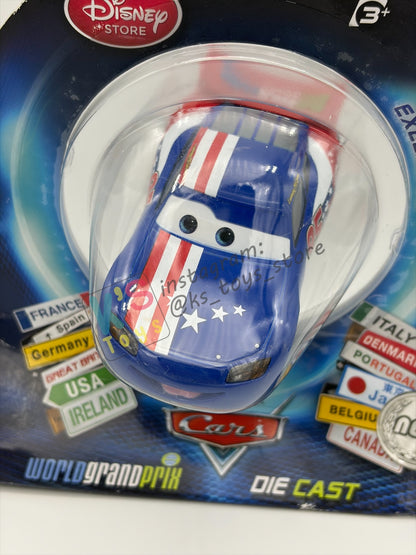 Disney Store Version of Disney Pixar Cars 1:43 - USA LIGHTNING MCQUEEN - COUNTRY WGP EXCLUSIVE INTERNATIONAL SERIES - BNIP