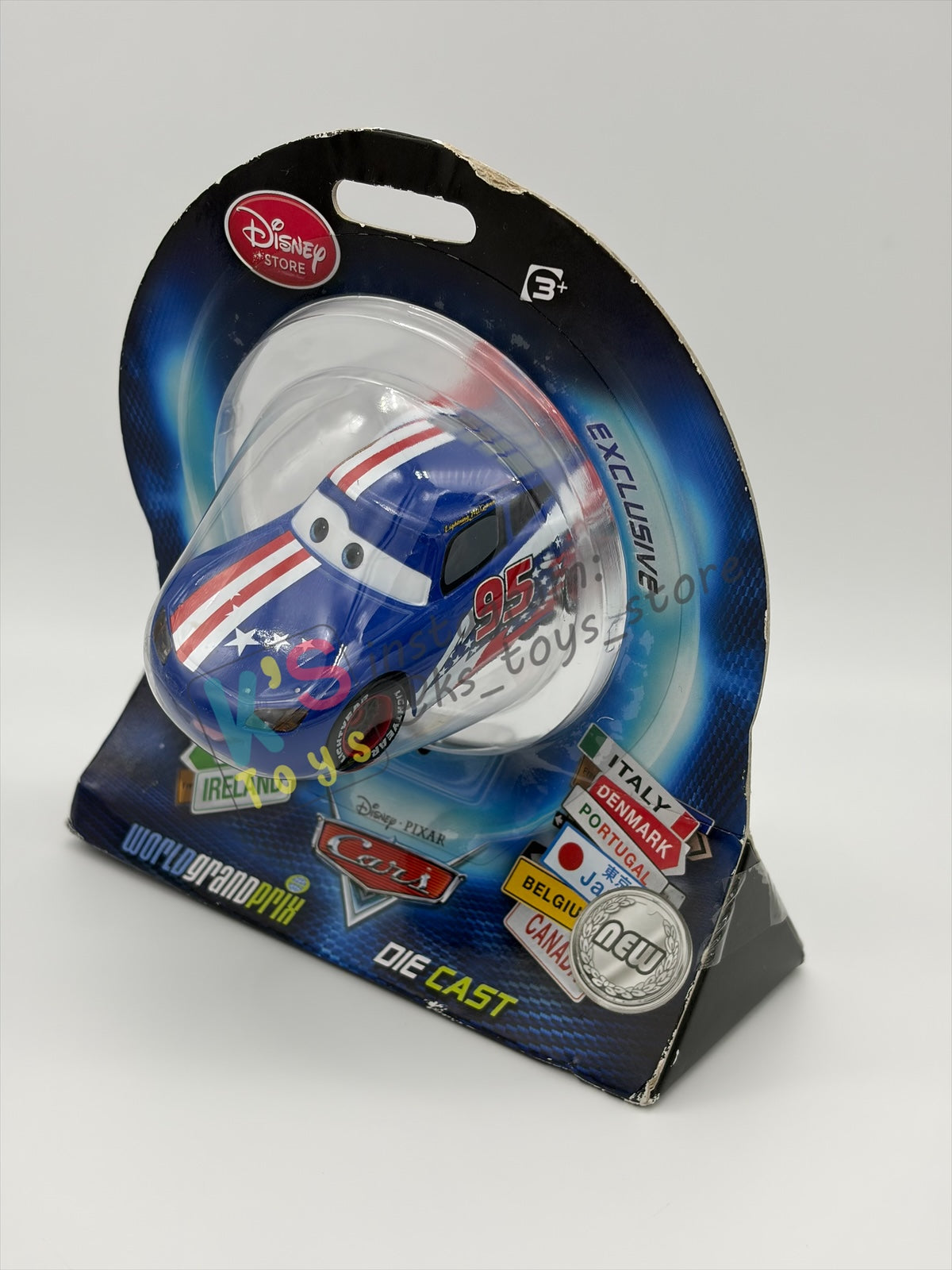 Disney Store Version of Disney Pixar Cars 1:43 - USA LIGHTNING MCQUEEN - COUNTRY WGP EXCLUSIVE INTERNATIONAL SERIES - BNIP