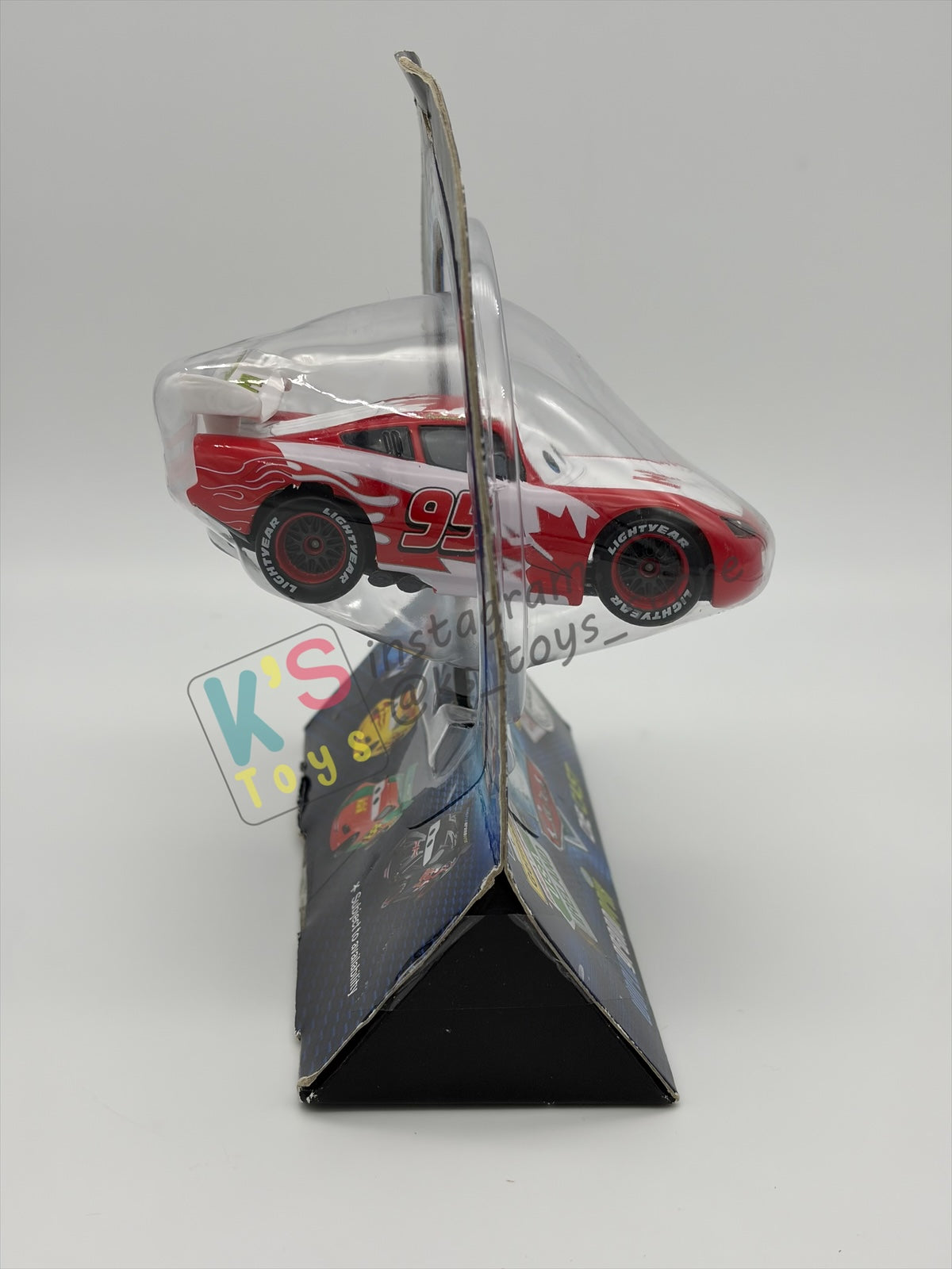 Disney Store Version of Disney Pixar Cars 1:43 - CANADA LIGHTNING MCQUEEN - COUNTRY WGP EXCLUSIVE INTERNATIONAL SERIES - BNIP