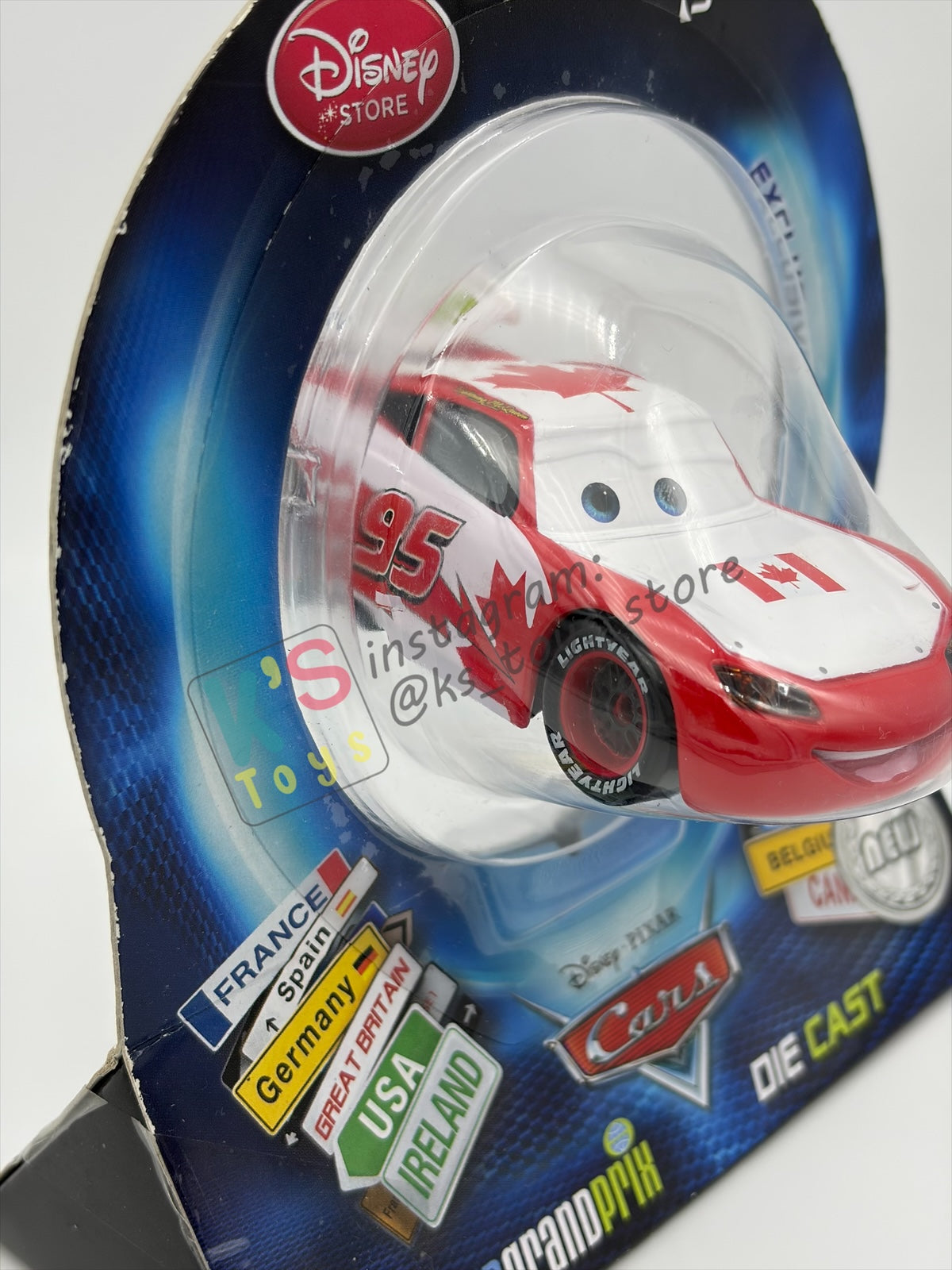 Disney Store Version of Disney Pixar Cars 1:43 - CANADA LIGHTNING MCQUEEN - COUNTRY WGP EXCLUSIVE INTERNATIONAL SERIES - BNIP