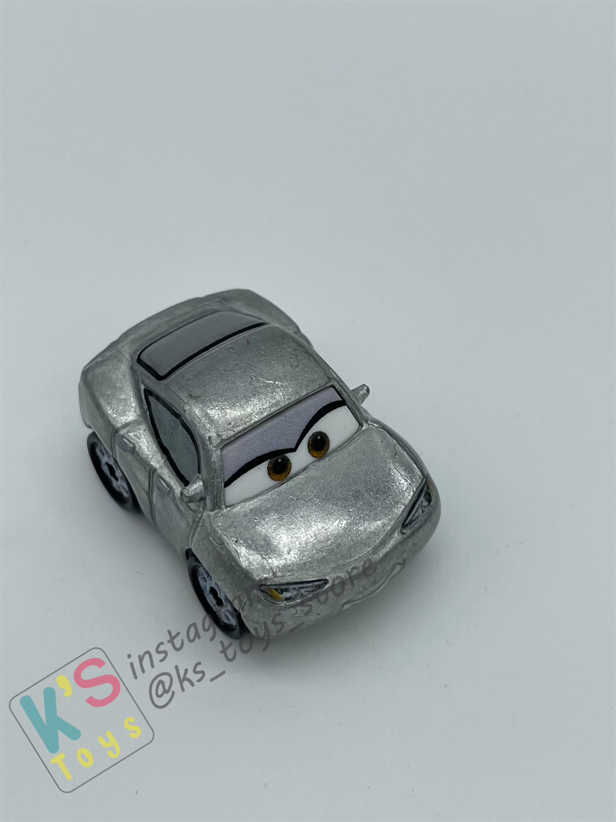 Loose Mini Racers Pixar Disney Cars, Silver Natalie Certain - Displayed Condition