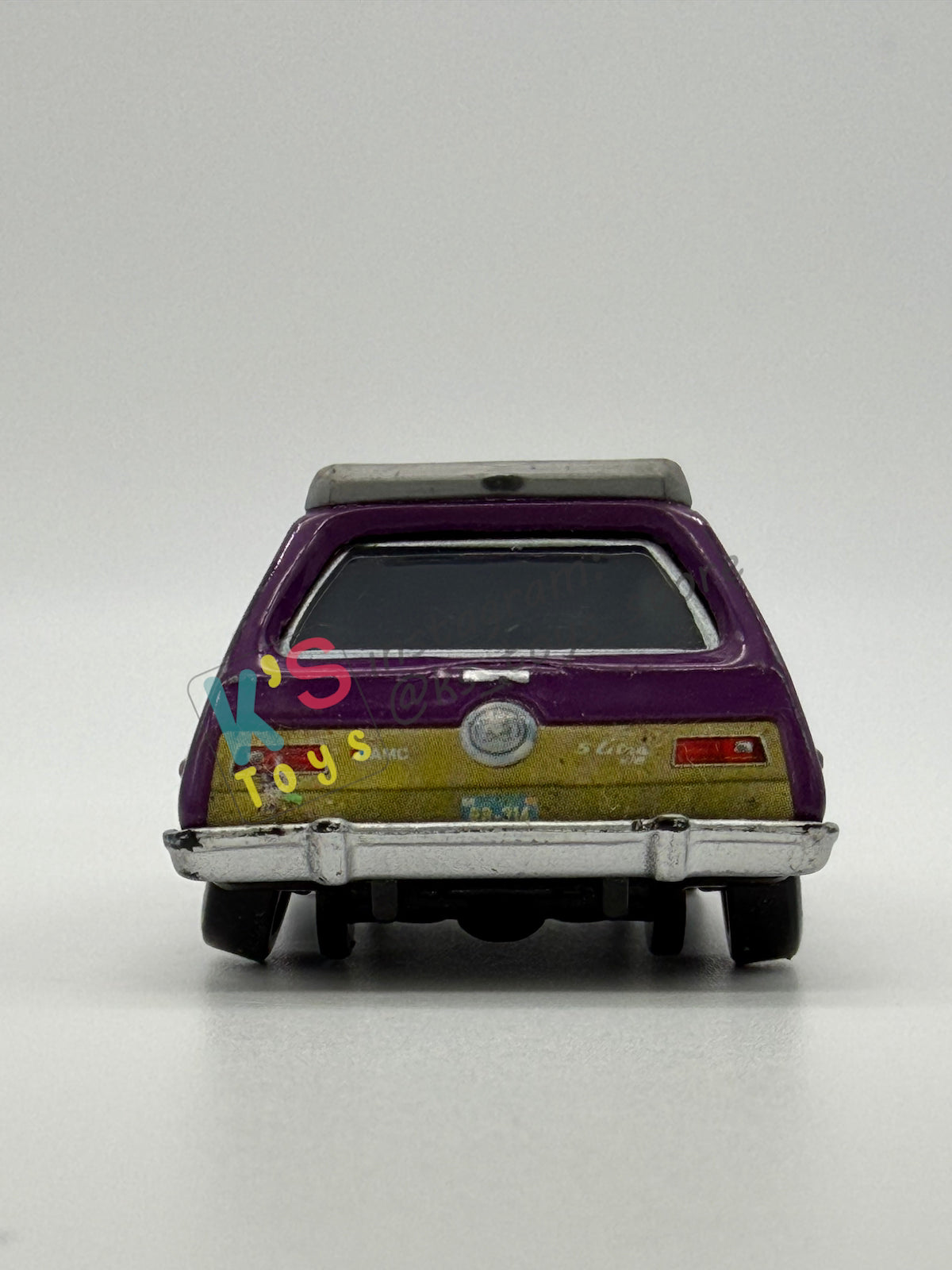 PRE-OWNED / LOOSE DISNEY PIXAR CARS - “J. CURBY GREMLIN" - CARS 2 LEMONS SERIES - NEAR MINT CONDITION