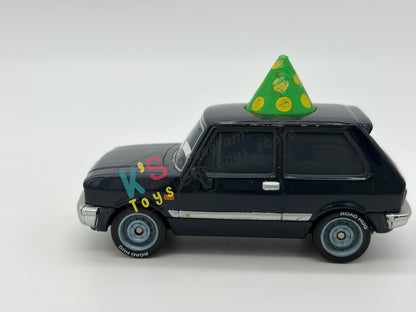 PRE-OWNED / LOOSE DISNEY PIXAR CARS - “ALEXANDER HUGO WITH PARTY HAT" - CARS 2 LEMONS SERIES - GOOD CONDITION