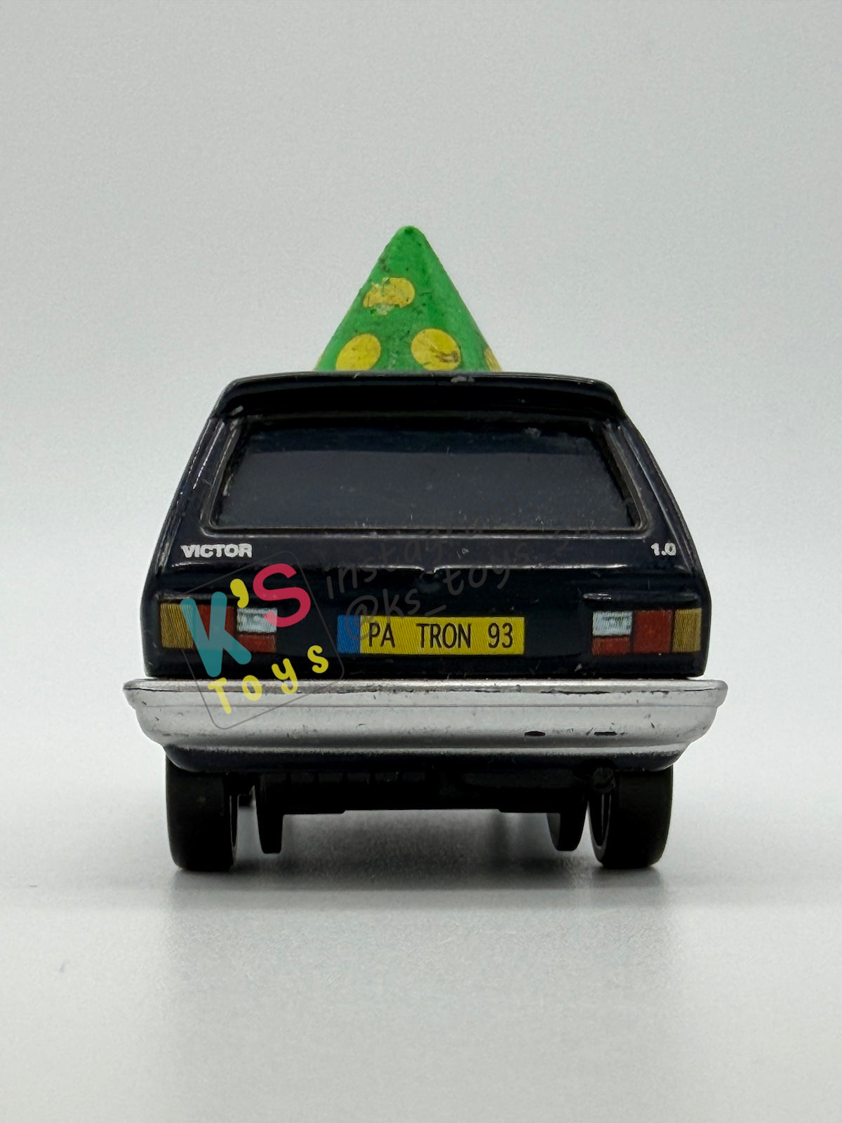 PRE-OWNED / LOOSE DISNEY PIXAR CARS - “ALEXANDER HUGO WITH PARTY HAT" - CARS 2 LEMONS SERIES - GOOD CONDITION