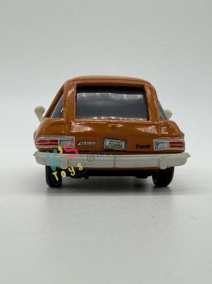 PRE-OWNED / LOOSE DISNEY PIXAR CARS - “TUBBS PACER CHINA" - CARS 2 LEMONS SERIES - NEAR MINT CONDITION