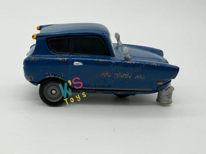 PRE-OWNED / LOOSE DISNEY PIXAR CARS - “TOMBER WITH OIL CAN" - CARS 2 PARIS ESPIONAGE 5 PACK SERIES - NEAR MINT CONDITION