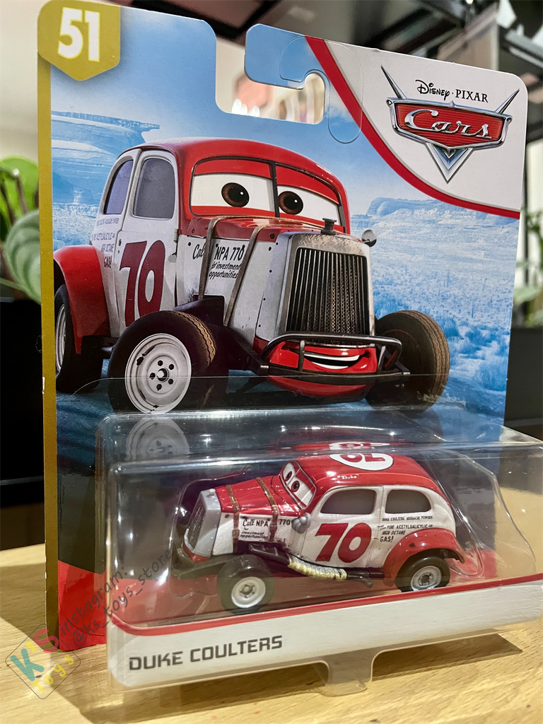 DISNEY PIXAR CARS "DUKE COULTERS" DOC'S RACING - BNIP